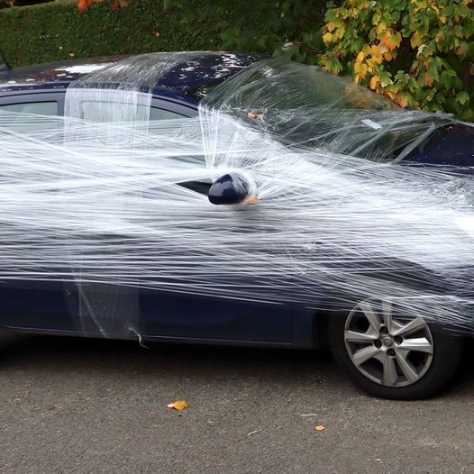 I SPENT THE ENTIRE MORNING CUTTING THROUGH THE LAYERS OF TAPE. While scraping the tape glue off my windows, I had plenty of time to come up with my revenge plan. And oh, it was going to be glorious. How I got back at the neighbor who covered my car in tape is in the comments below.